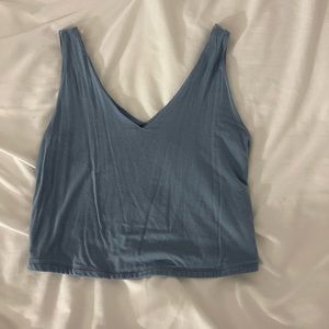 Tight, thick, cropped blue tank